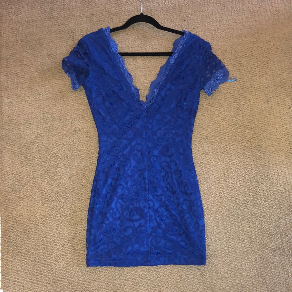 Blue bodycon dress.